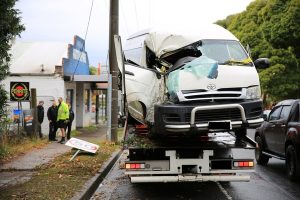 Minibus crashes into tree