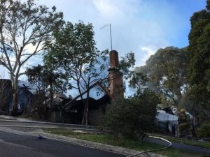 Firefighters are battling a house fire in Ferntree Gully