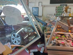 Car crashes into front window of Monbulk butcher