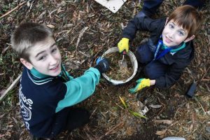 Groups in the Hills educating children about planting