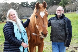Old timer helped to his feet