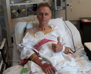 Local runner reunites with bystanders and paramedics who saved his life