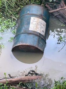 Leaking oil drum found dumped into Blind Creek in Ferntree Gully