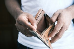 Household spending lifts in March but consumers remain cautious